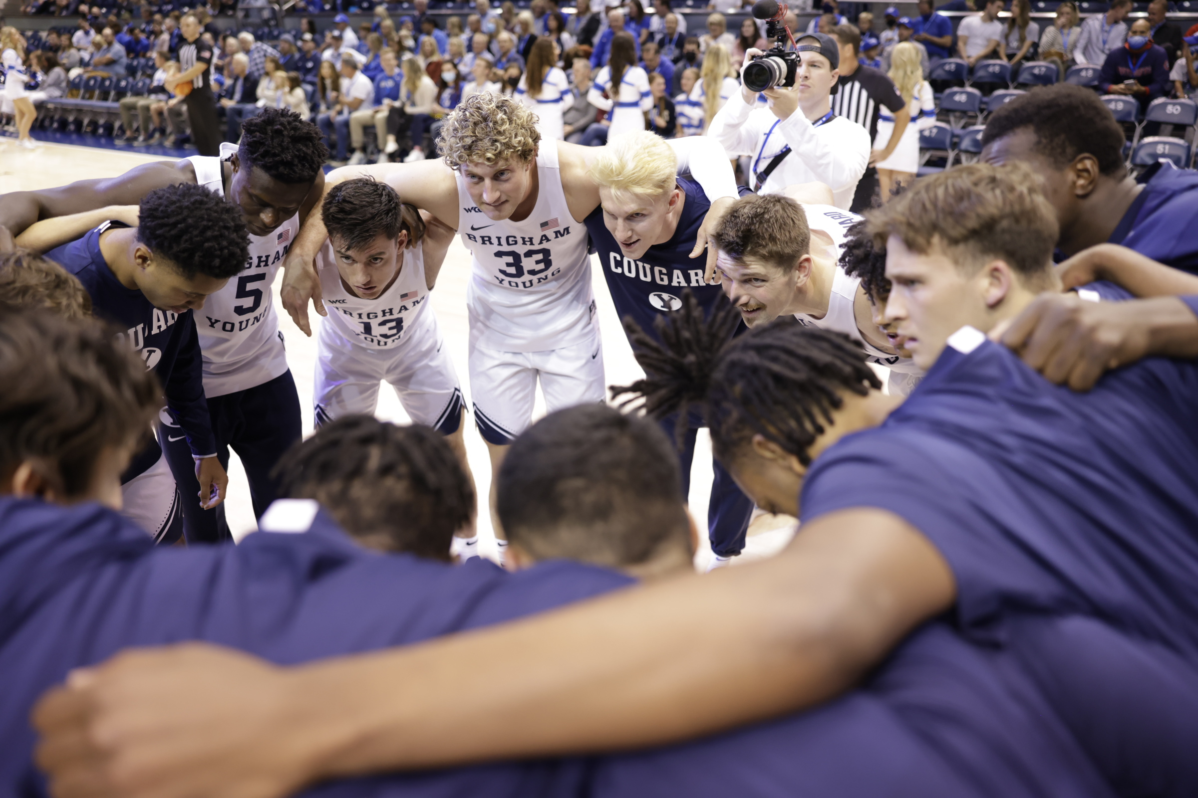 BYU men's basketball huddles together before the beginning of their 63-45 victory over Colorado Christian University.