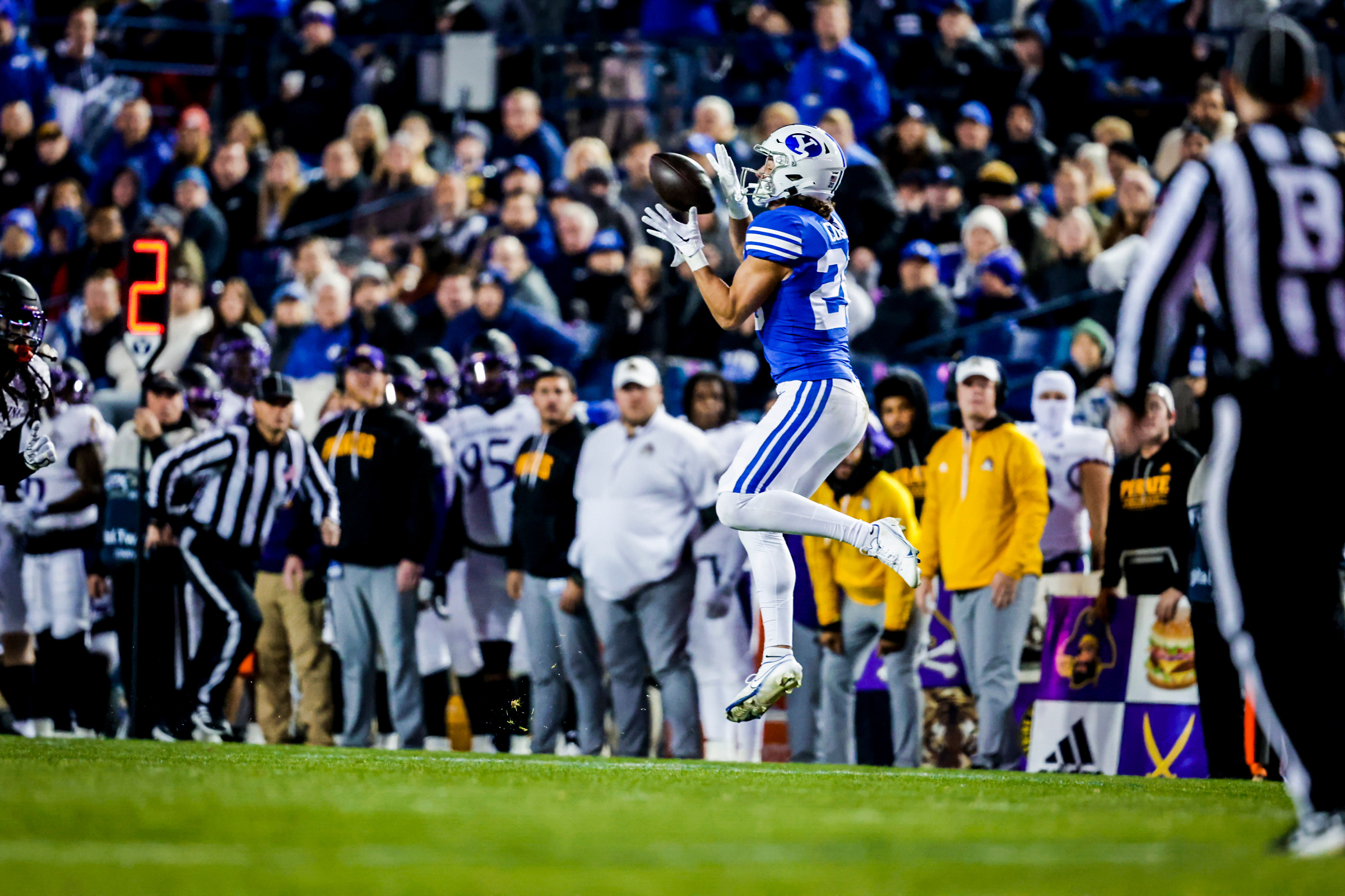 BYU wide receiver Braden Cosper catches a pass on the East Carolina sideline
