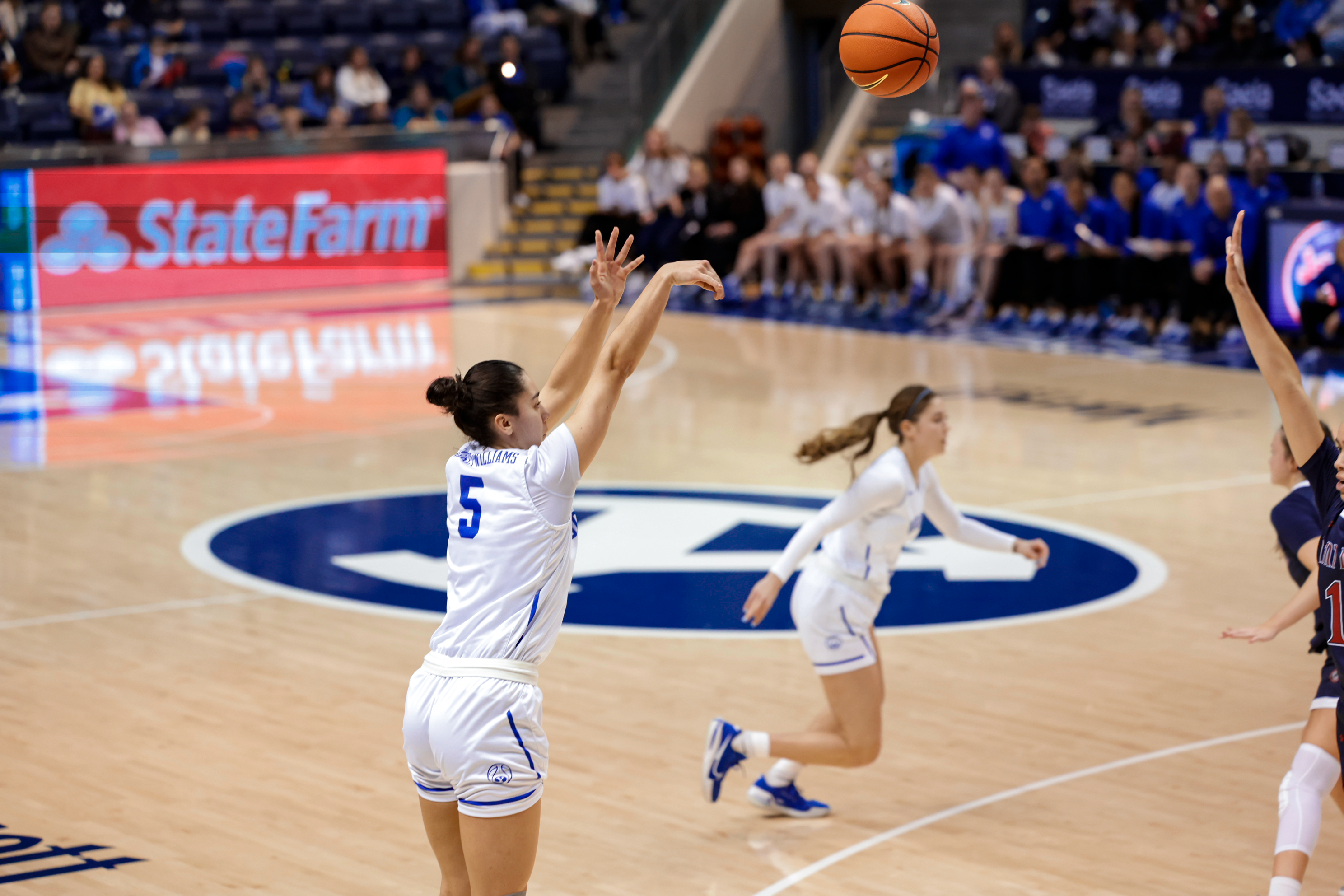 Arielle Mackey-Williams hits a three during a game against Saint Mary's at the Marriott Center.