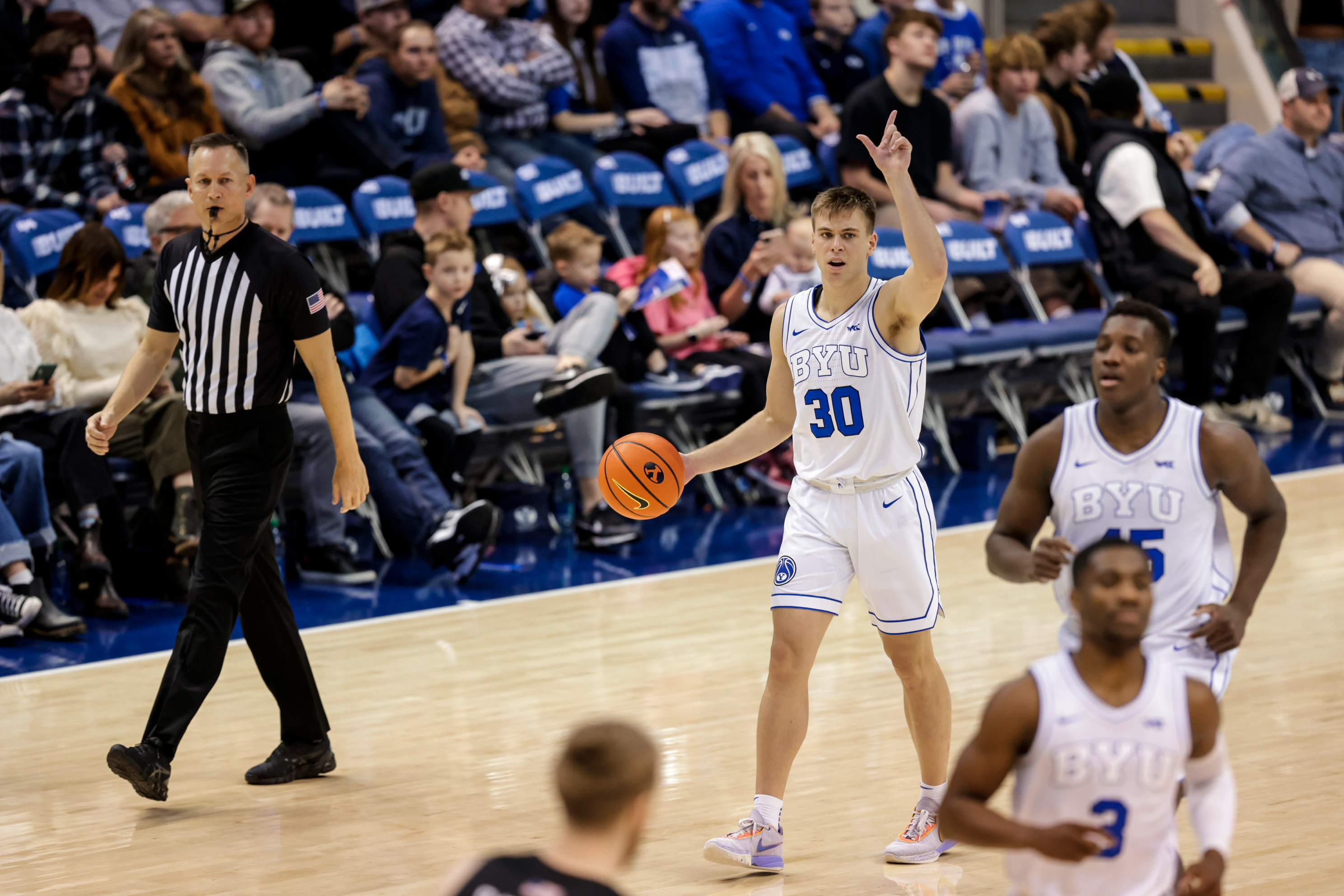 Dallin Hall directs the offense during a game against Portland at the ma