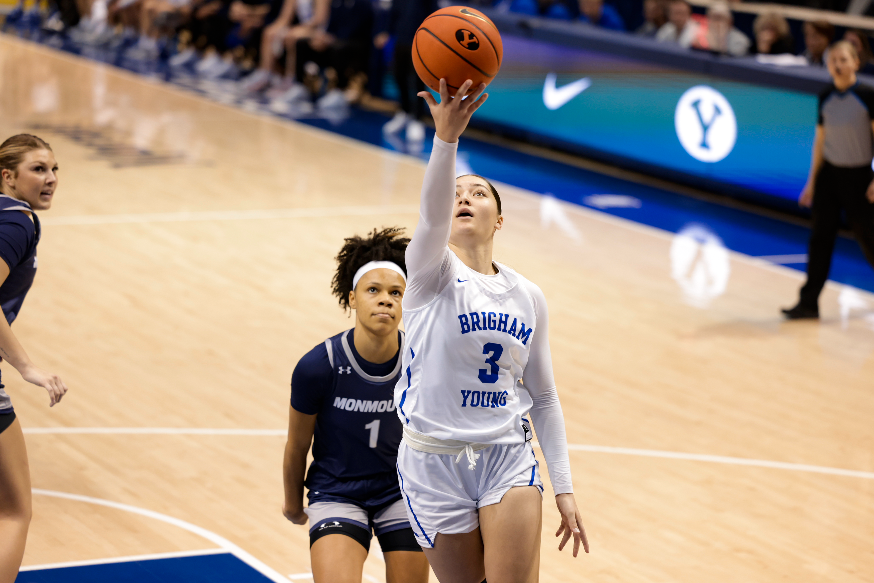 Nani Falatea scoops and scores during a 70-50 win over Monmouth at the Marriott Center.
