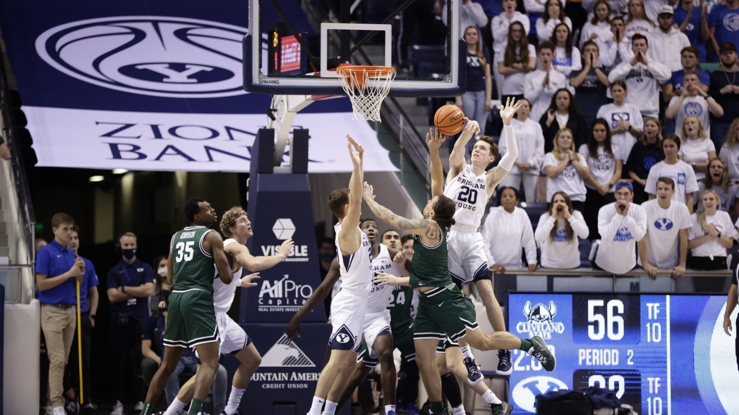 BYU guard Spencer Johnson blocks a Cleveland State shot in the Cougars' 69-59 win over the Vikings at the Marriott Center. 