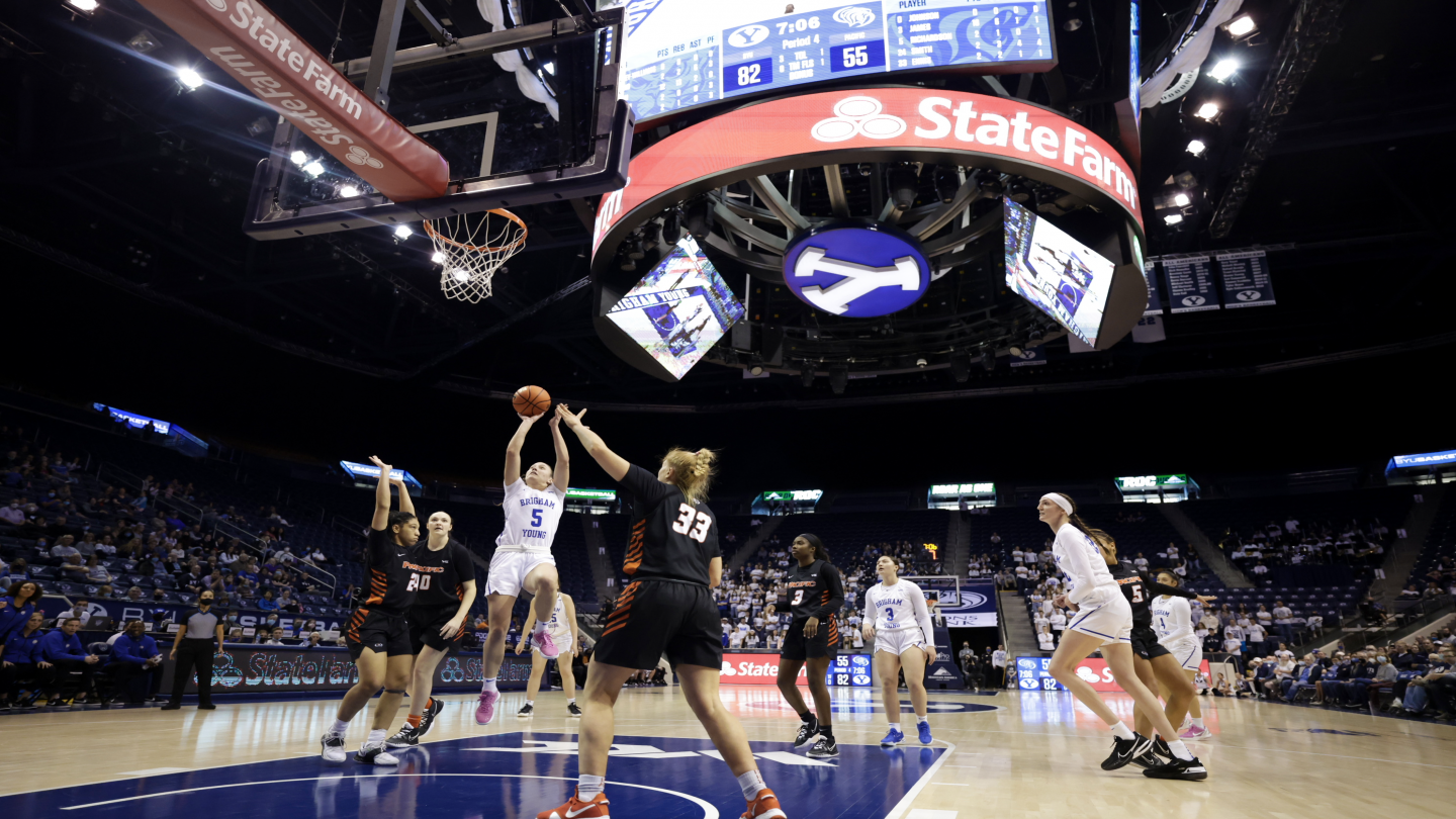 Maria Albiero drives to the basket for a scoop-and-score in a 94-68 BYU win over the Pacific Tigers at the Marriott Center Saturday night.