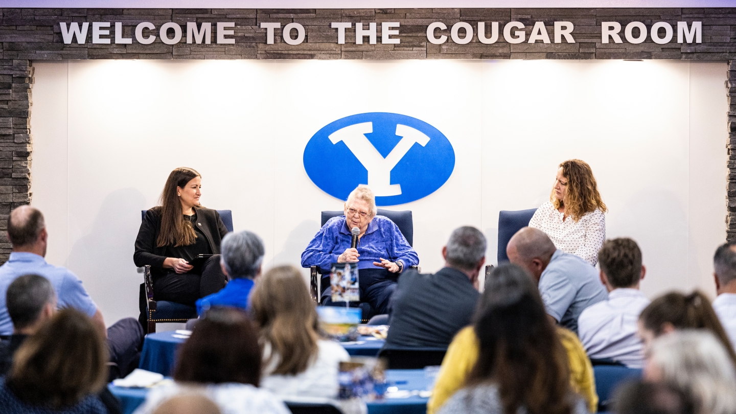 Liz Darger, Elaine Michaelis and Janie Penfield Rasmussen addressing a room of BYU employees on the 50th anniversary of Title IX