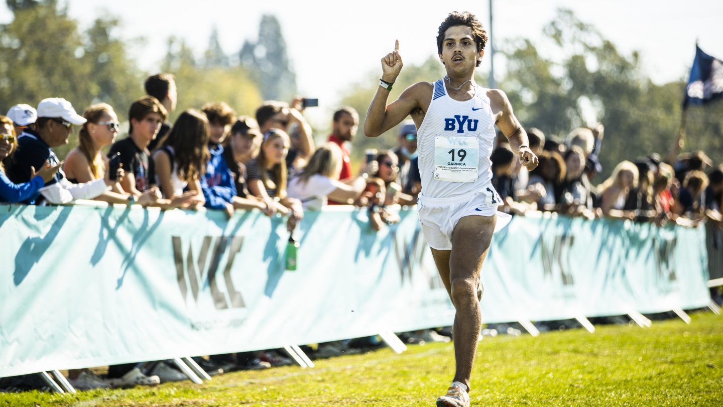Brandon Garnica crosses the finish at the 2021 WCC men's cross country championships