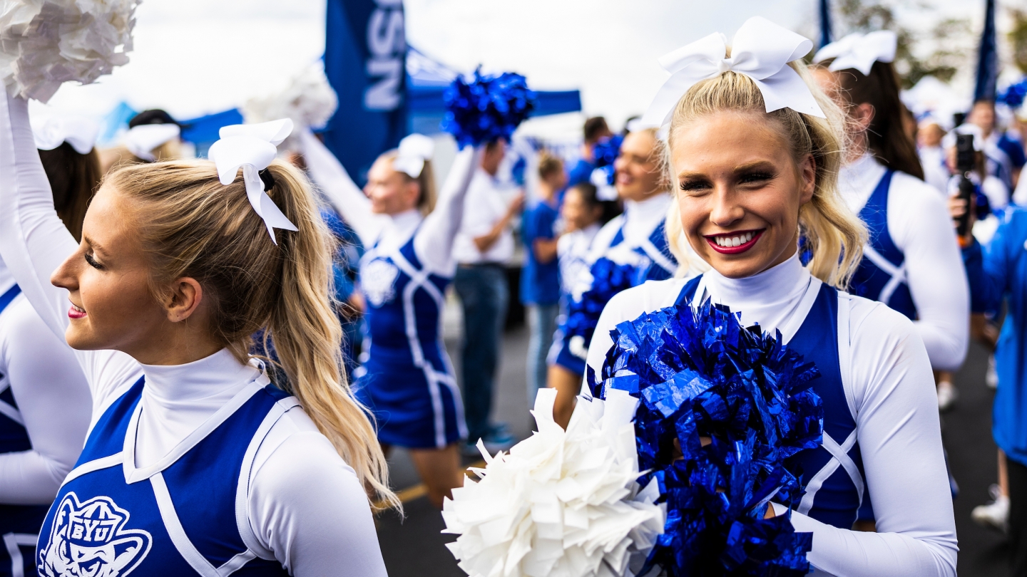 BYU cheerleaders on the Cougar walk before a 2022 home football game
