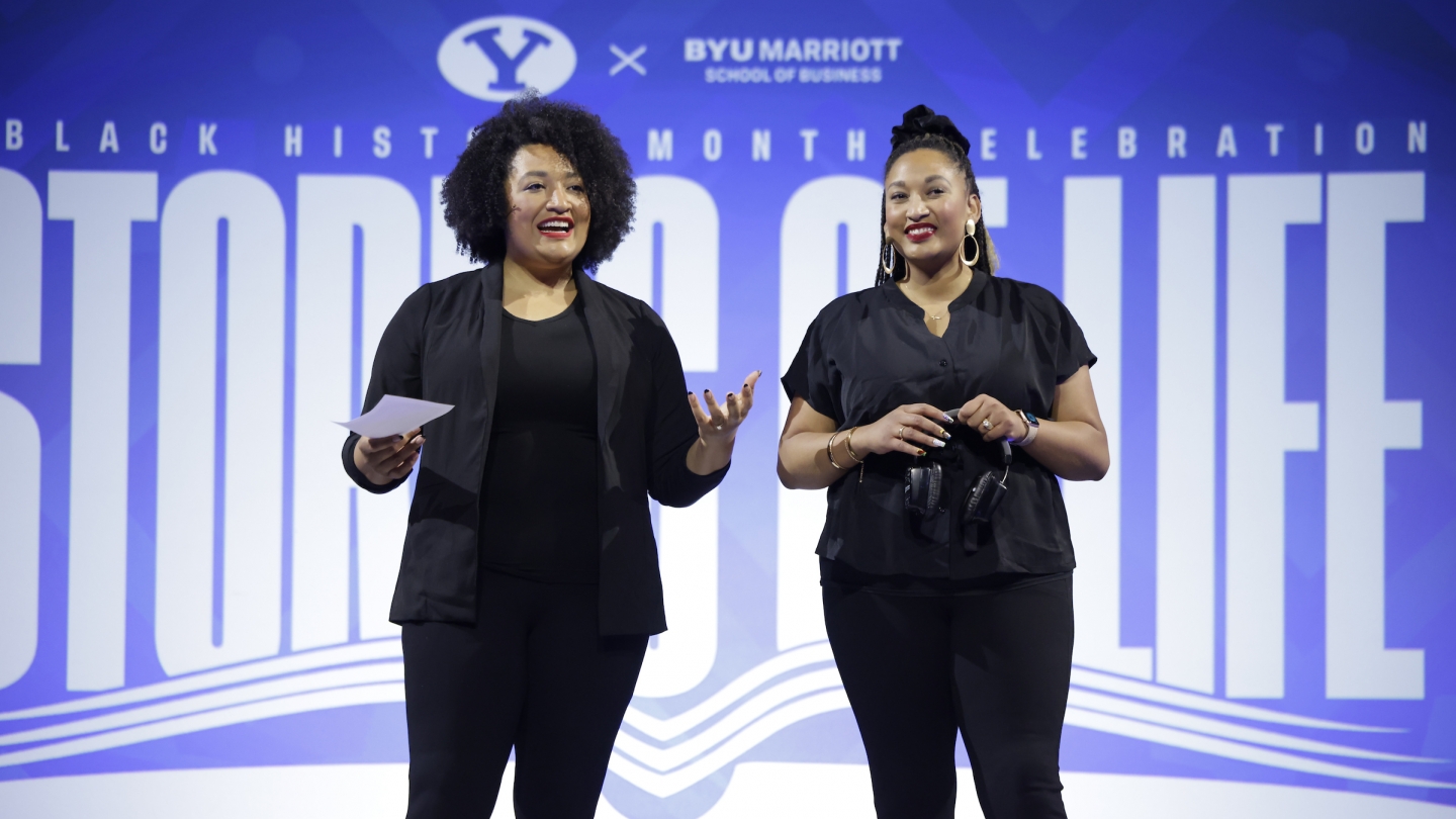 The Let's Talk Sis sisters on stage at the Stories for Life Black History Month event held in the BYU Marriott Center