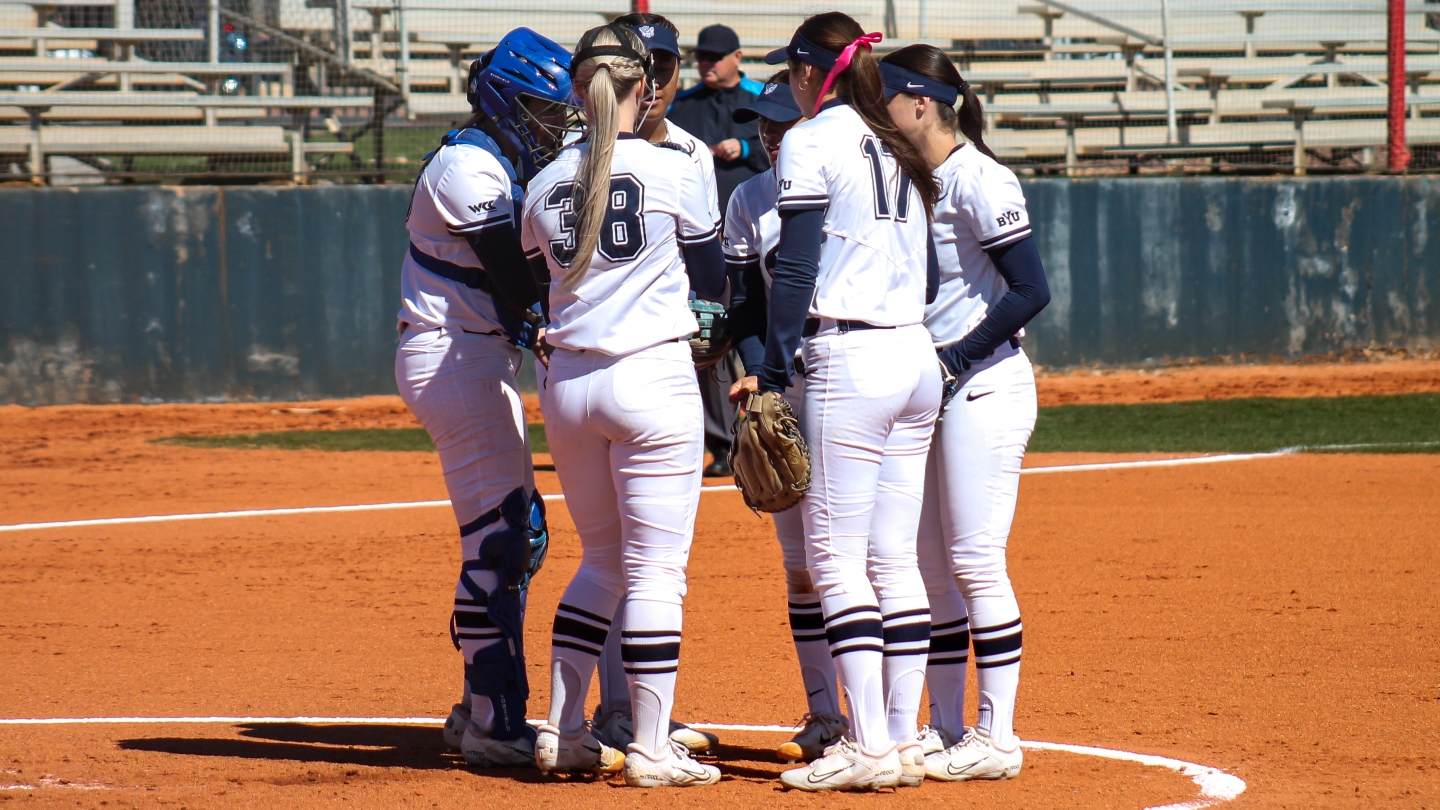 BYU softball meets at the mound during 7-4 loss to Oregon State in the Trailblazer Tournament at Utah Tech on Thursday, March 2, 2023