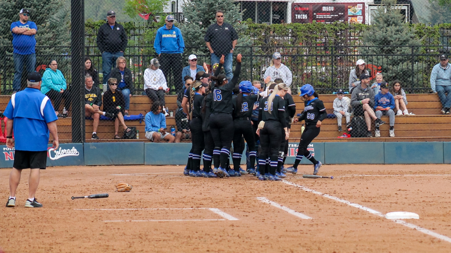Ailana Agbayani comes home after hitting 3-run homer against South Dakota State in NISC semifinal