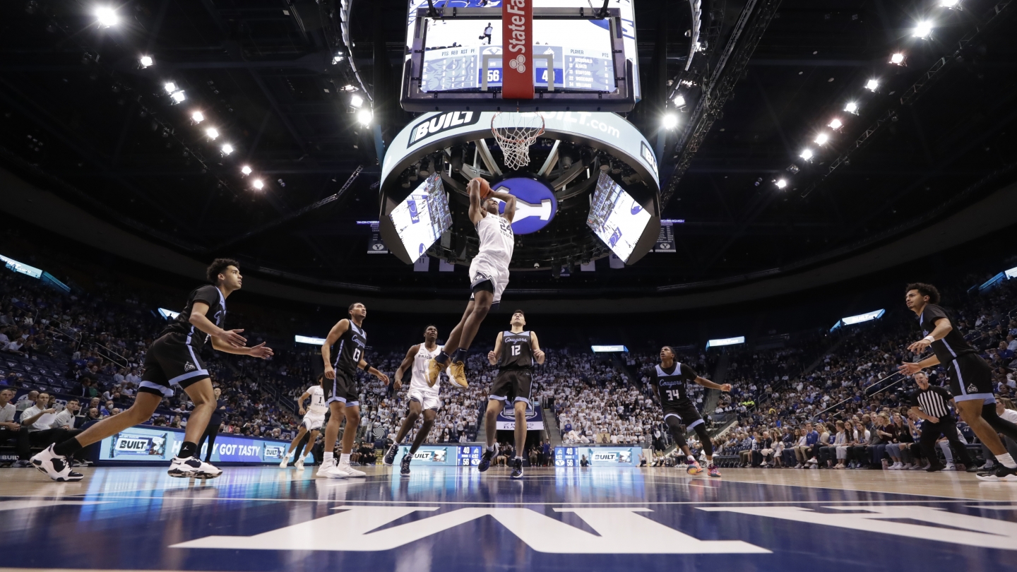 BYU basketball player Seneca Knight throws down a hammer dunk in a 63-45 win over Colorado Christian on Thursday night.