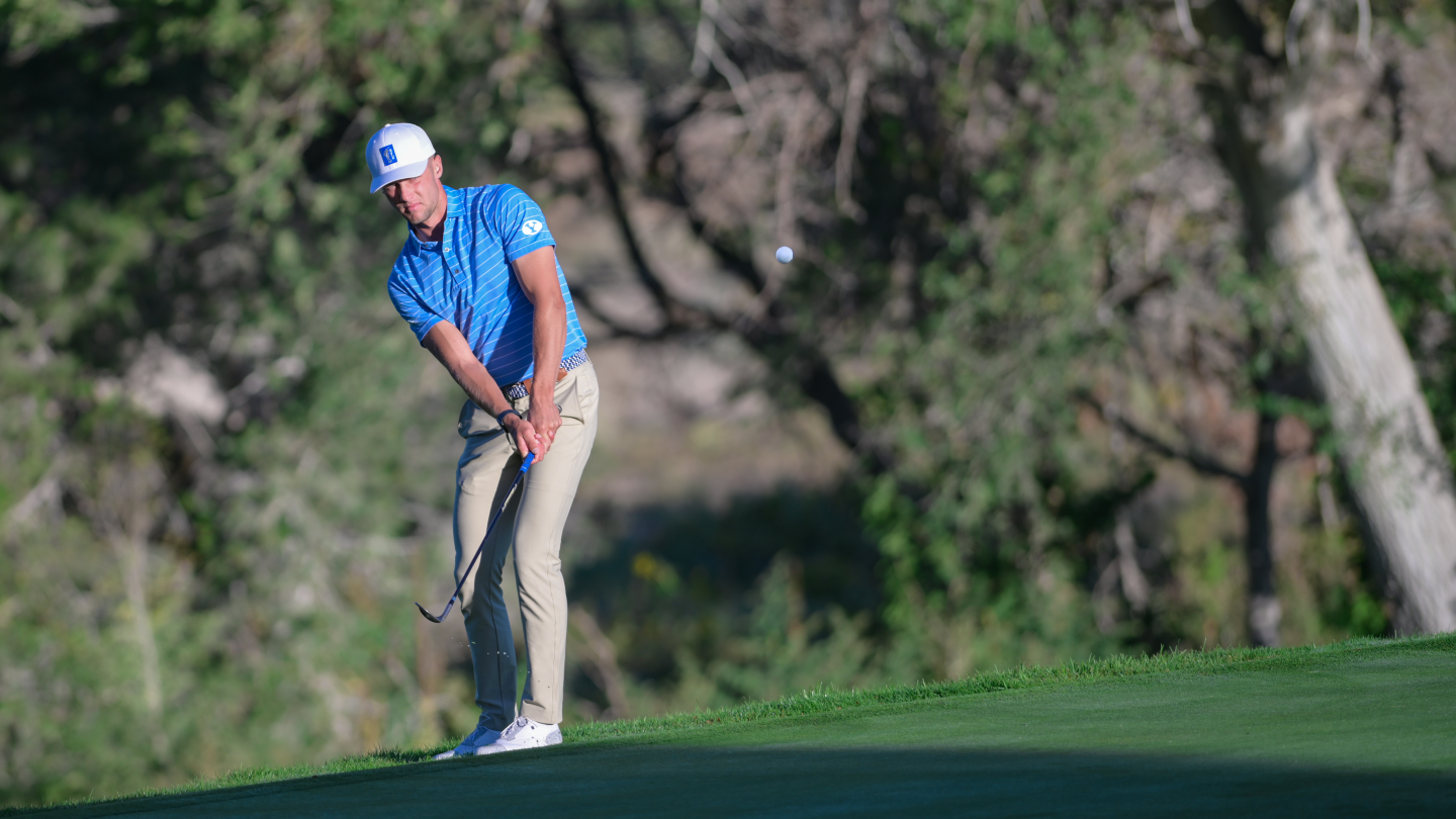 BYU golfer David TImmins hits a chip during round one of the William H. Tucker Intercollegiate.